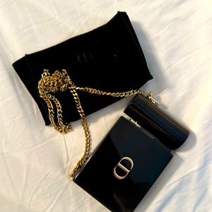 Christian Dior  black with gold hardware lipstick bag with Matte Plum lipstick